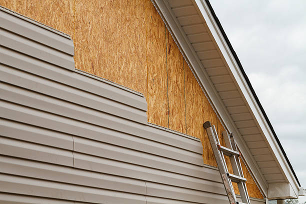 Professional Siding Installation technician working in Lincoln University, PA